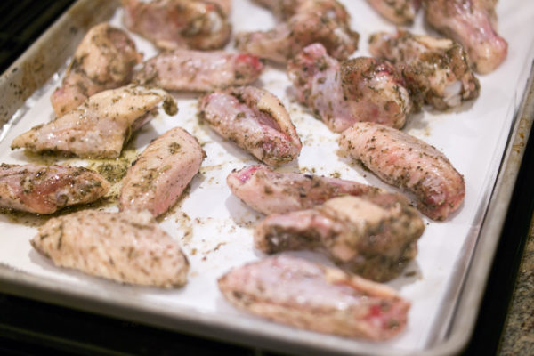 roasted herbed chicken wings ready to go in the oven